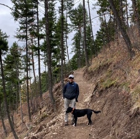 Tom and dog on a hike