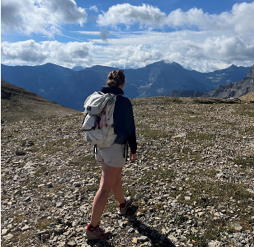 Teigan hiking in the mountains