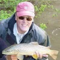 James holding a fish